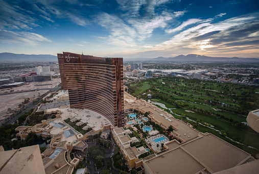 Las Vegas, Nevada, USA - May 5, 2014: Working round-the-clock modern Vegas hotels and casinos Wynn and Encore at sunrise aerial view scene in Las Vegas, Nevada on May 5, 2014.