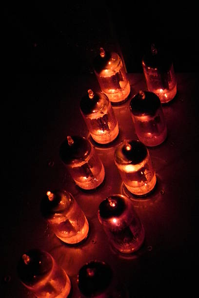 istock Old Vacuum tubes aglow in darkness 2. 465073686