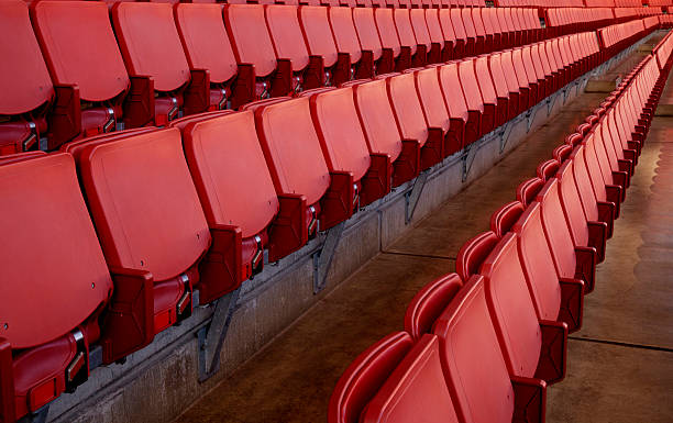 Seats in an empty stadium stock photo