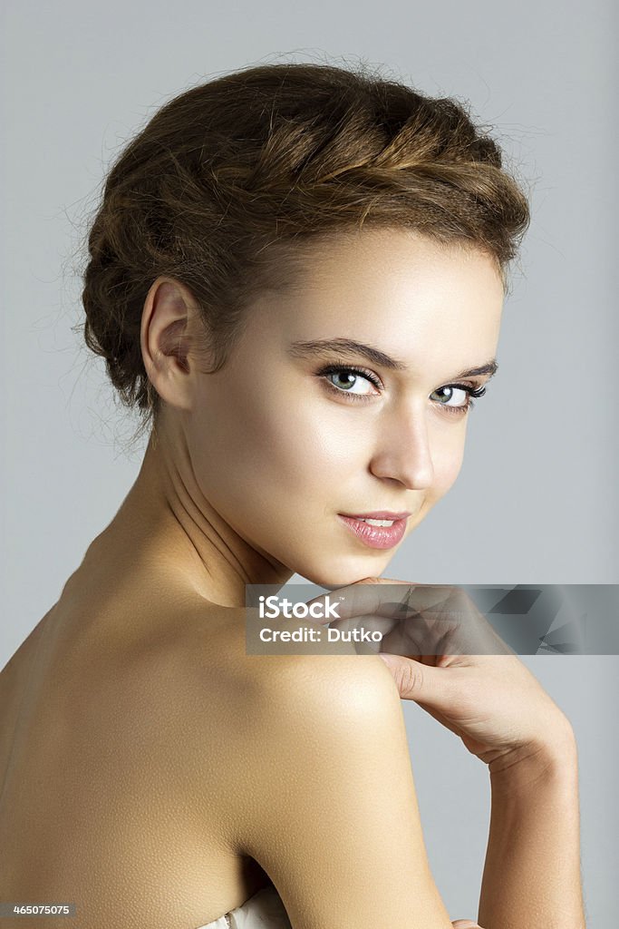 Young Beautiful Spa Woman Touching her Face Adult Stock Photo