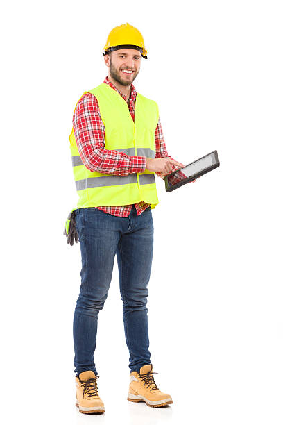 ingenieur mit einem digitalen tablet - construction worker building contractor craftsperson full length stock-fotos und bilder