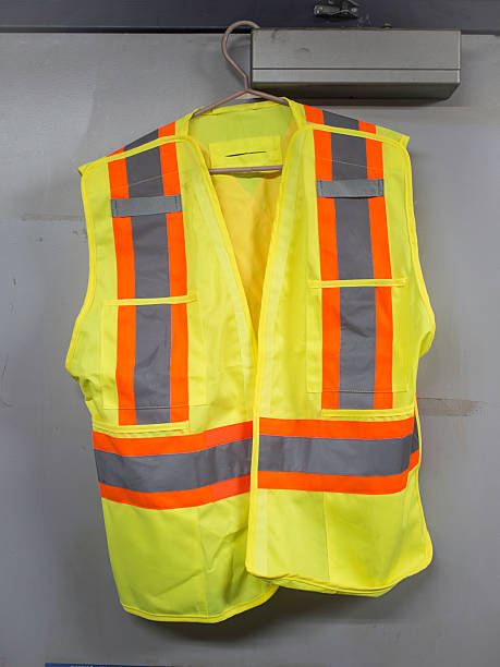 istock safety vest reflective security hanger yellow orange gray door 465075985