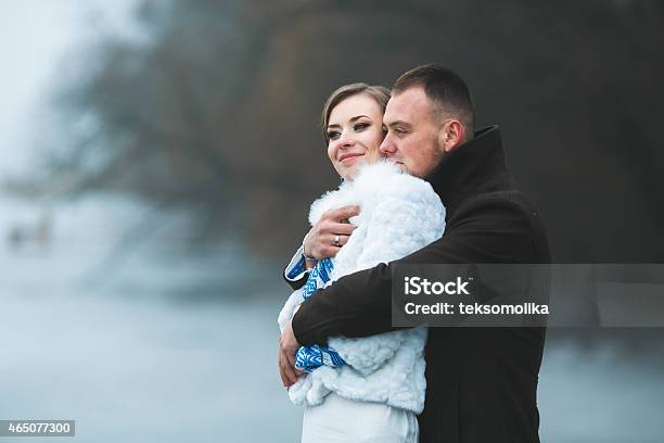 Beautiful Couple On The Dock In The Winter Fog Stock Photo - Download Image Now - 2015, Activity, Adult