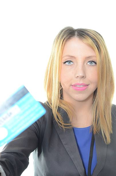 istock Woman in suit with credit card 465078105