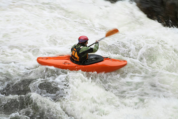 istock Woman kayaking in river 465078268