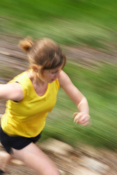 istock Woman Running On Track 465078344