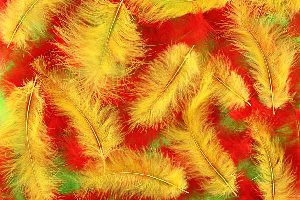 istock Red, yellow and green plumes background 465081786