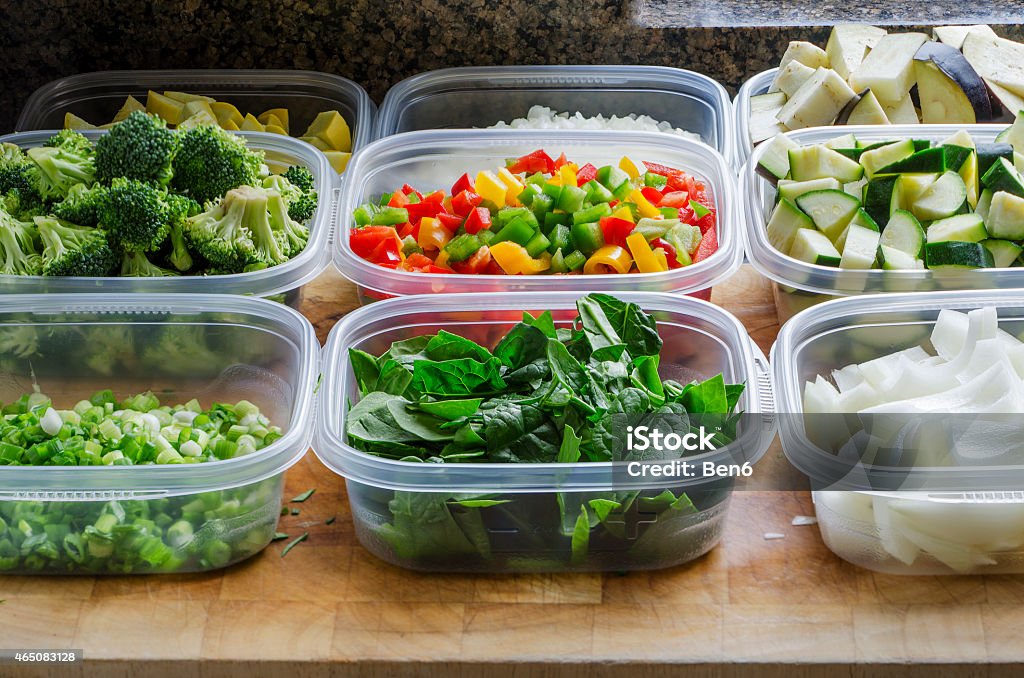 chopped vegetables in plastic containers Chopped vegetables for cooking or storage in plastic   containers Container Stock Photo