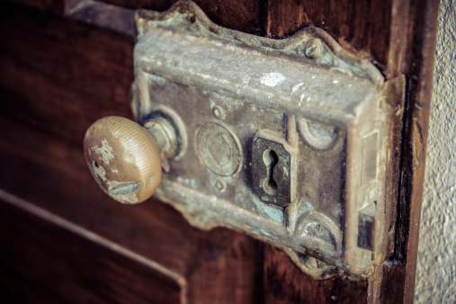 a close up of an old door lock