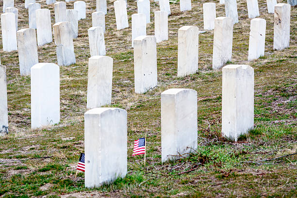istock White tomb stones at a military cemetery 465084596