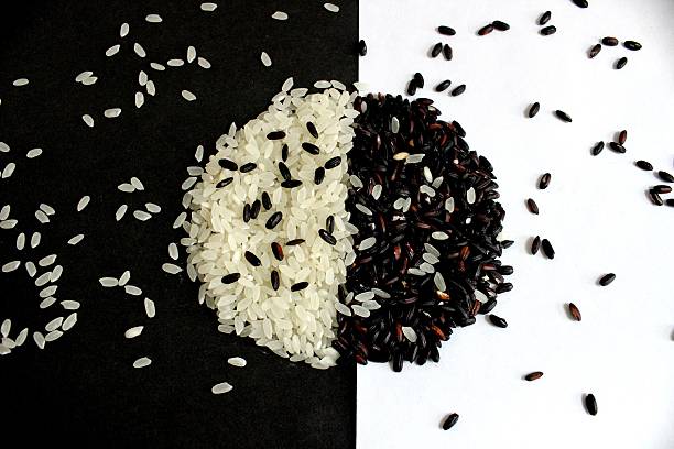 istock Black and white rice - yin and yang 465084714