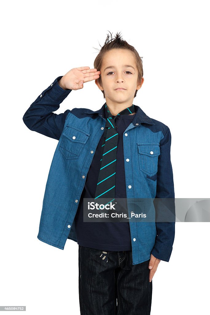 Handsome child doing different expressions in different sets of clothes Handsome child doing different expressions in different sets of clothes: at attention 2015 Stock Photo