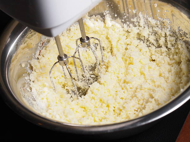 istock Mixing butter and sugar in bowl with mixing machine 465087768