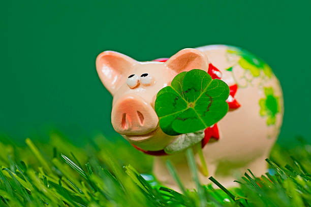 istock Lucky charm pig, figurine with cloverleaf 465088816