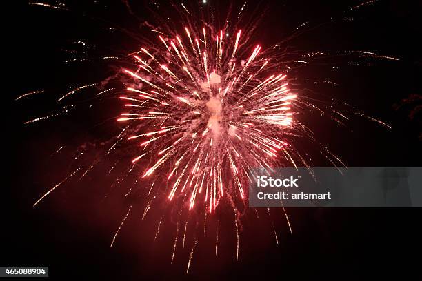 Impressive Red Fireworks In Sky At Night Stock Photo - Download Image Now - 2015, Abstract, Anniversary