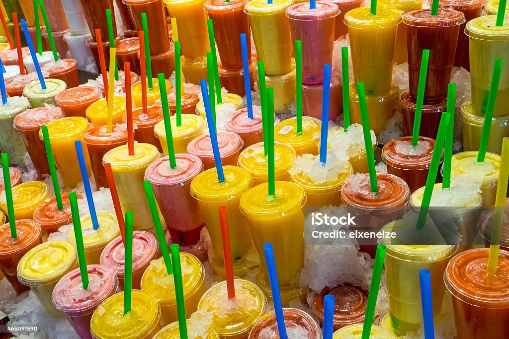 Fruit smoothies at a market Fruit smoothies at the Boqueria market in Barcelona 2015 Stock Photo