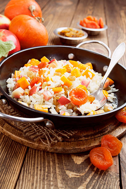 istock Sweet pilaf with pumpkin, apples and dried fruit 465091734