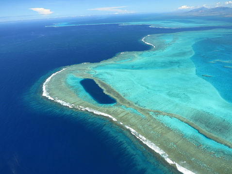 Coral reef, pass and Trou d'Oundjo seen from ULM - Lagoon New Caledonia