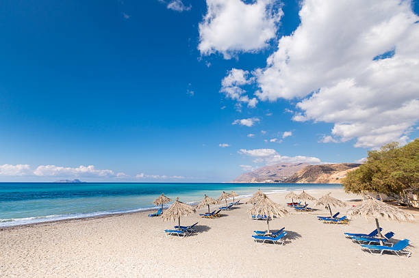 Aerial panorama of the turquoise sea of the holiday suburb Varkiza Beach at the south coast of Athens, Attica, Greece