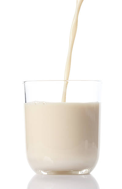 istock glass of milk isolated on white 465094698