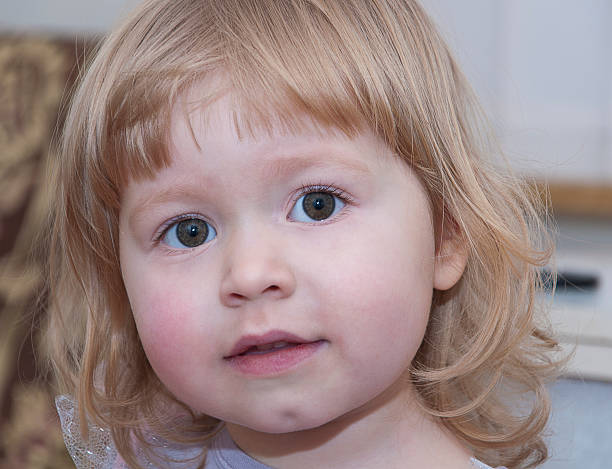 istock Little suprised girl is looking 465095035