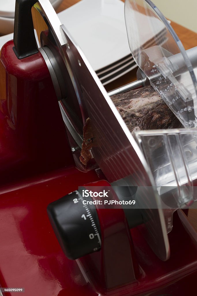 Italian Bresaola (Beef) on Slicer Abstract Stock Photo