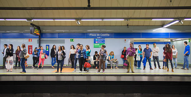 Madrid tube, underground station with commuters stock photo