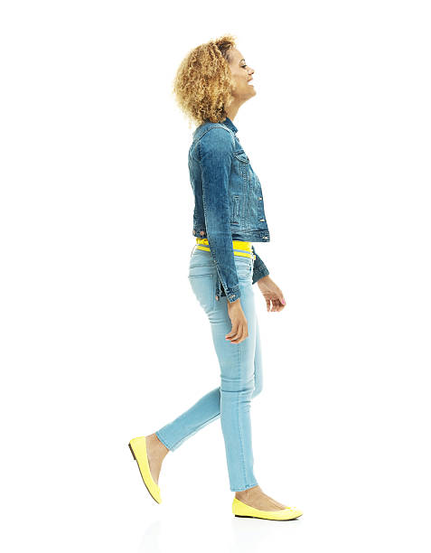 istock Cheerful woman walking and looking away 465099994