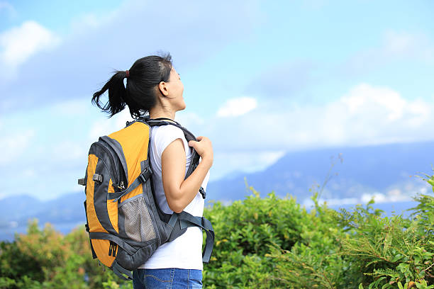 istock young woman hiker seaside mountain 465101401