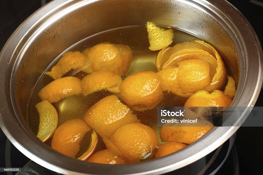 Simmer orange peel into syrup Candied Orange Zest Cooking. Series. Boiling Stock Photo