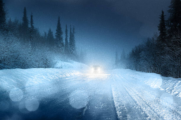 istock Headlights on an icy winter road 465102786