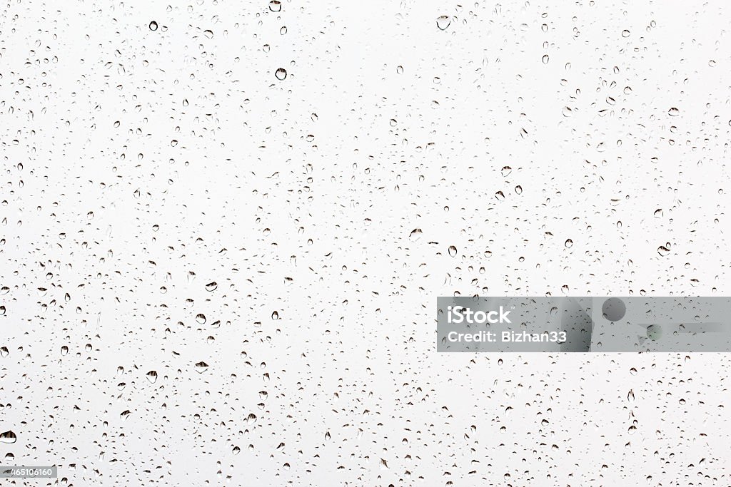 Water drops on the glass Drops of rain on a window glass Rain Stock Photo