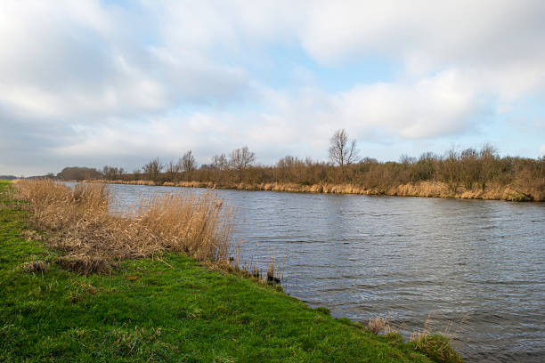 istock Canal through a rural landscape in winter 465109317