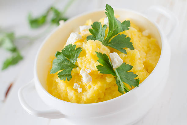 istock Banush - ukrainian corn dish with cottage cheese and parsley 465109424