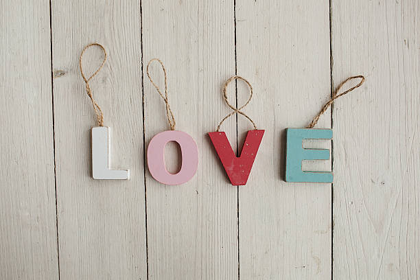 istock Love vintage letters on wooden background 465109538