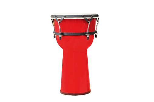 Image of red ethnic african drum under the white background
