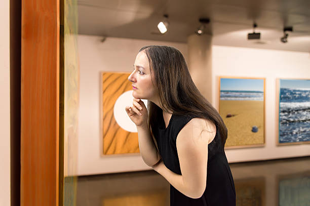 istock looking at a work of art onn the museum 465111788