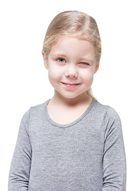 istock Beautiful little girl winking isolated 465112028
