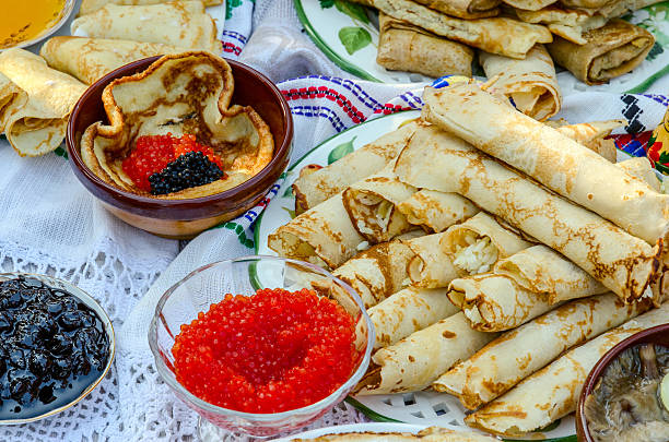 istock Pancakes with a stuffing from rice, with caviar, jam, mushrooms 465113358