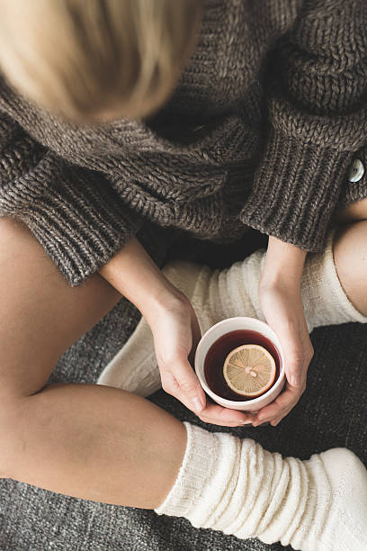 istock Cute girl holding hot tea 465113990