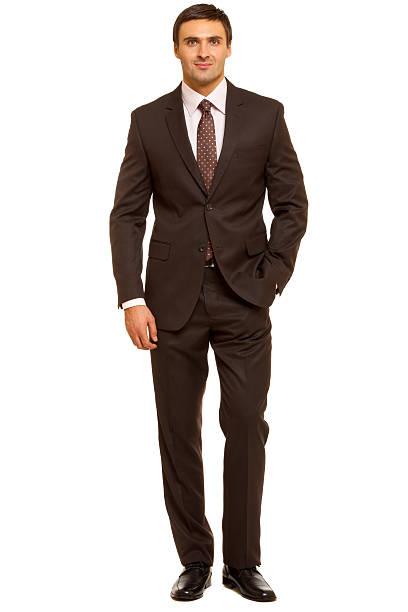 istock Well-dressed man. Charismatic businessman standing on white background 465114686