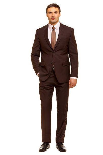 istock Well-dressed man. Charismatic businessman standing on white background 465114750