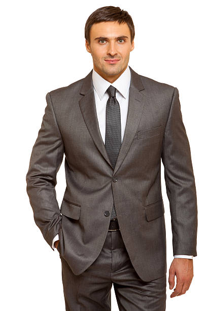 istock Well-dressed man. Charismatic businessman standing on white background 465114906