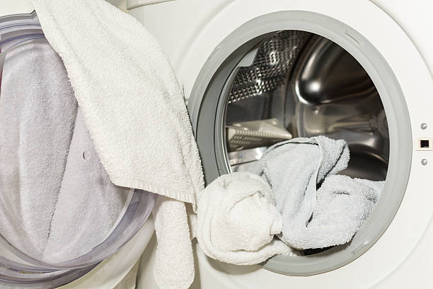 istock Towels in the washing machine 465115250