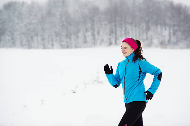 istock Winter running woman 465115489