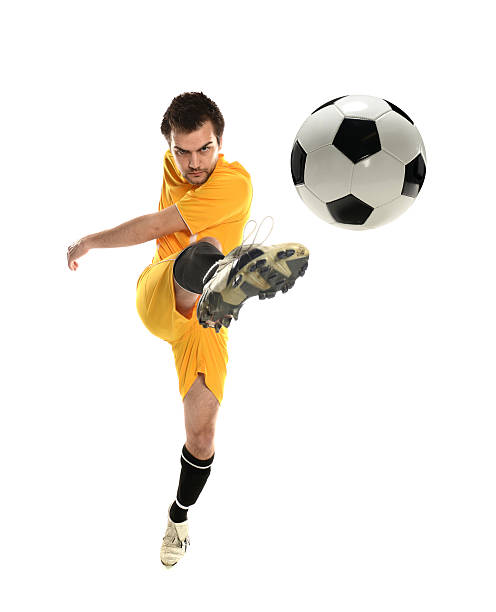 istock Soccer Player kicking the ball 465116441