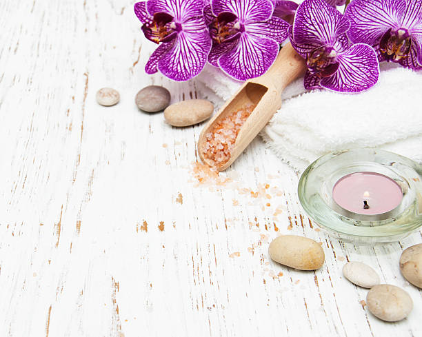 istock Candle, orcids and towels 465117126