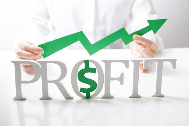 istock Word profit and human hands 465119506