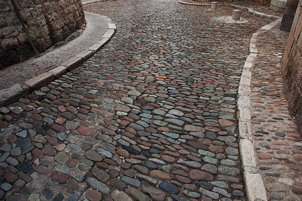 istock Stone paved road in the old city 465121429