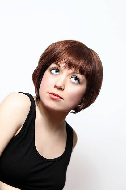 istock Beautiful young woman dreaming 465121662